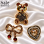 SET BROOCH 3PCS TEDDY BEAR GOLD + BOW DROP RED + HEART PEARL AMBER