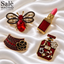 SET BROOCH 4PCS RED FASHION BEE RED CRYSTAL + LIPSTICK + HAT CAMELLIA +NO5 PERFUME