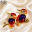 BROOCH COLORFUL WOOD PECKER DUO